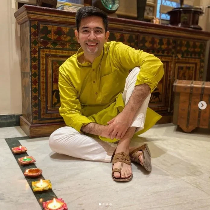 raghav chadha seated on the floor in the living room of his house 0 1200.jpg